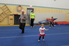 Dad chases his great grandchildren